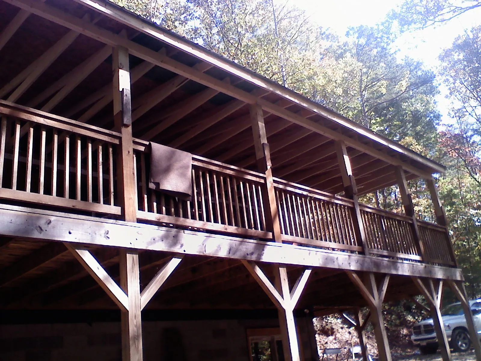 Timber framing under a new elevated porch and deck — Roof Leak Repair in Woodbridge by Roofing Brothers
